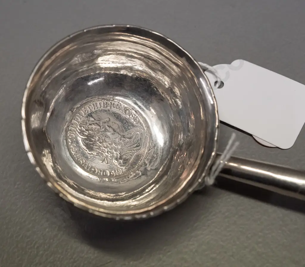 silver toddy ladle with balleen handle and inset coin marked Georgius Rex, date 1720. Some denting to bowl. L-240 Image 1++