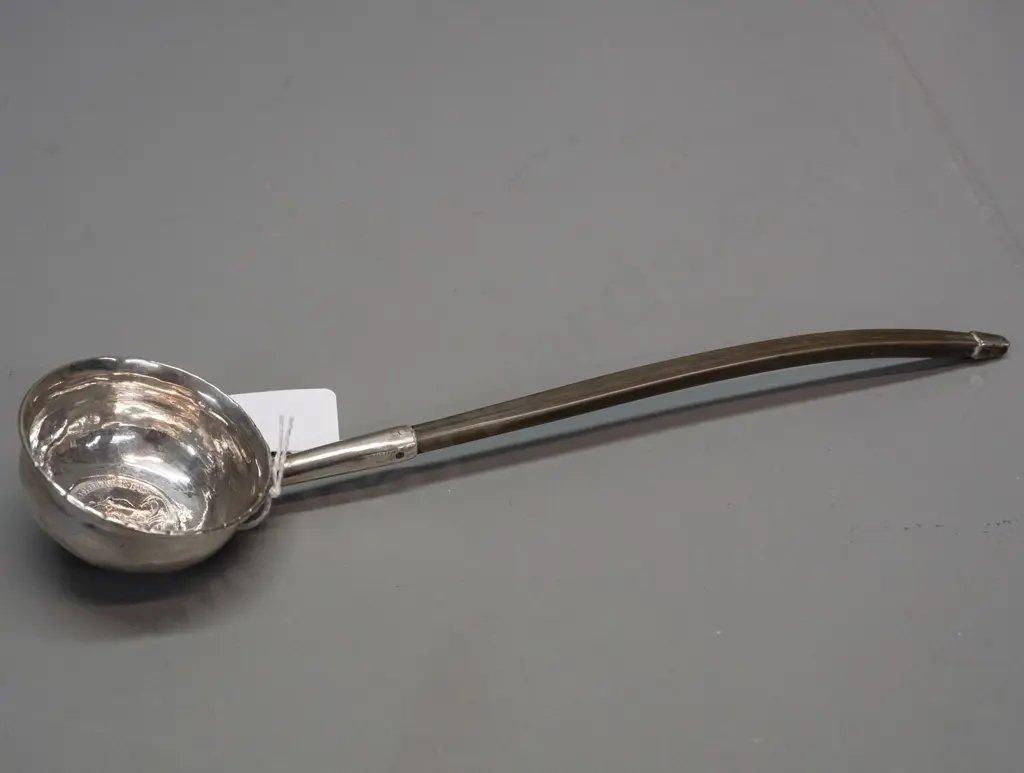 silver toddy ladle with balleen handle and inset coin marked Georgius Rex, date 1720. Some denting to bowl. L-240 Image 1++