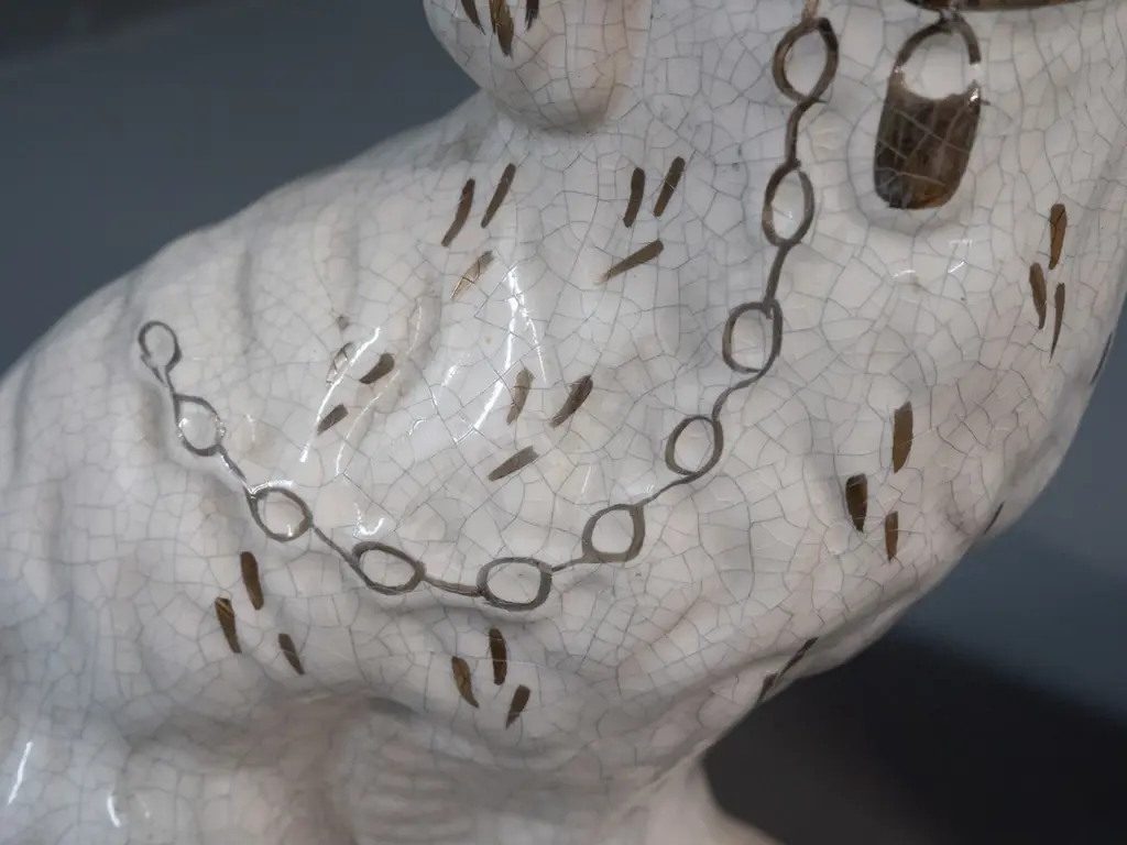 pair of Staffordshire style dog figures with craze-effect glaze, hand painted & gilt decoration - some marks and sticker Image 1++