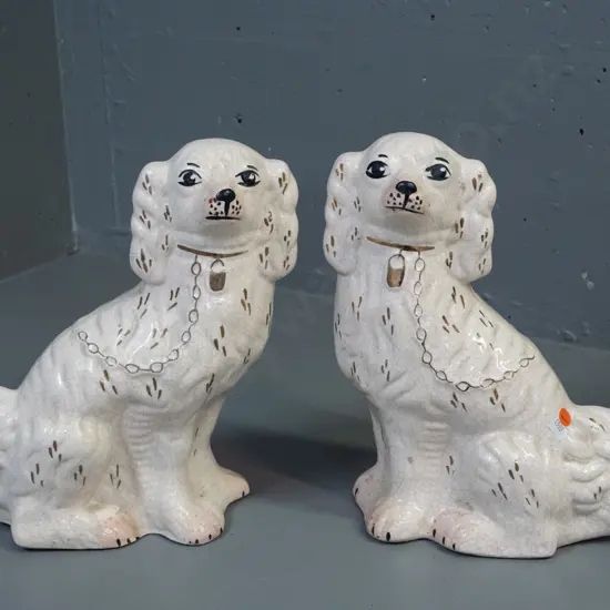 pair of Staffordshire style dog figures with craze-effect glaze, hand painted & gilt decoration - some marks and sticker