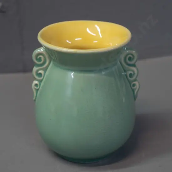 small Crown Lynn celadon green and yellow interior vase with flared rim - number .130. on base. H-100 D-80