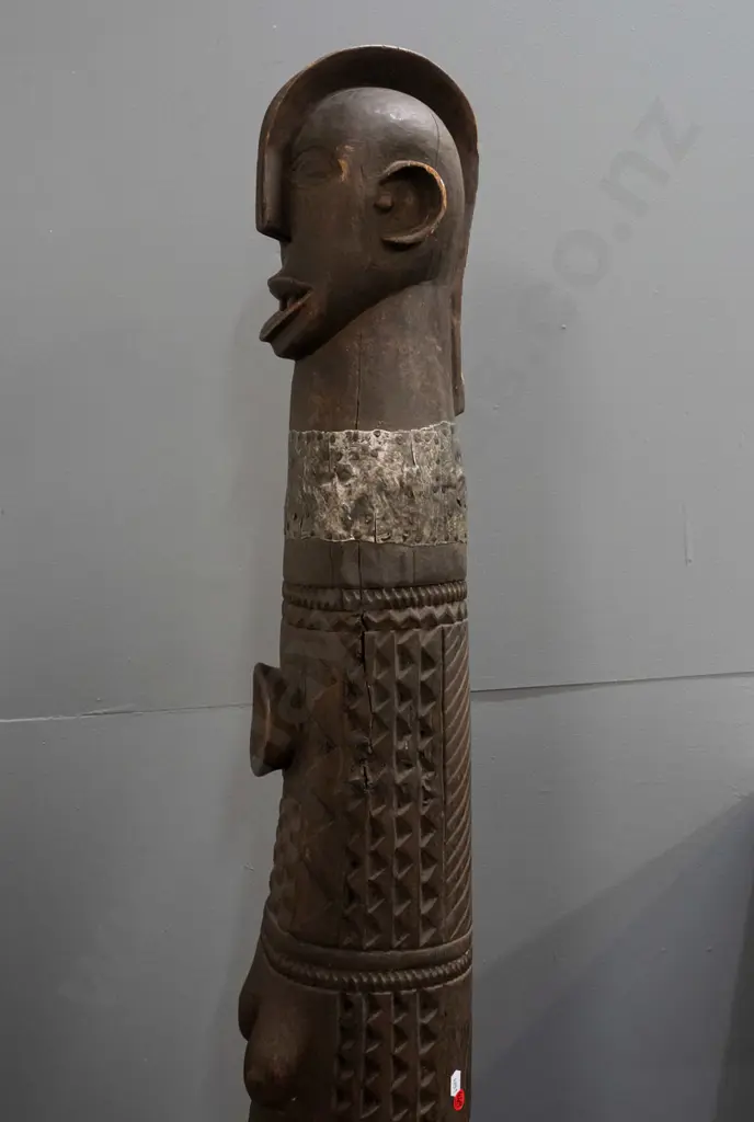 very heavy carved timber African figure, base carved from hardwood tree trunk, with white metal neck band applied with Image 1++