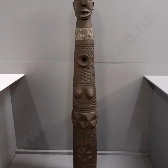 very heavy carved timber African figure, base carved from hardwood tree trunk, with white metal neck band applied with