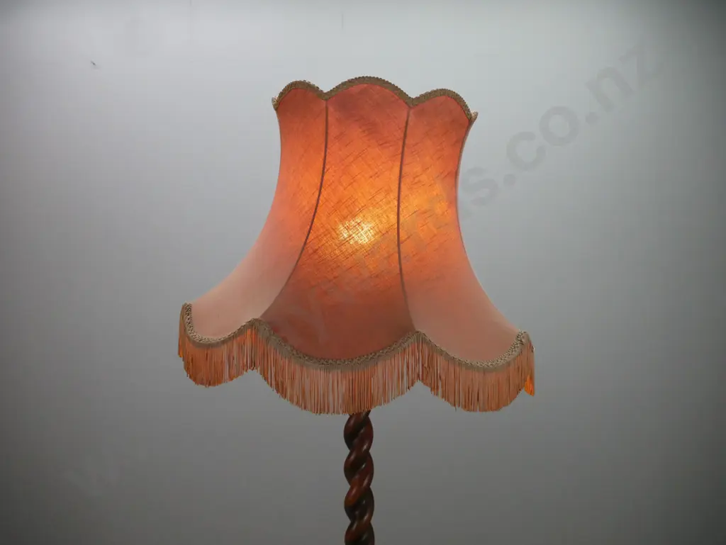 vintage oak standard lamp with Jacobean twist column, circular stepped base on bun feet, with waisted frilled shade - Image 1++