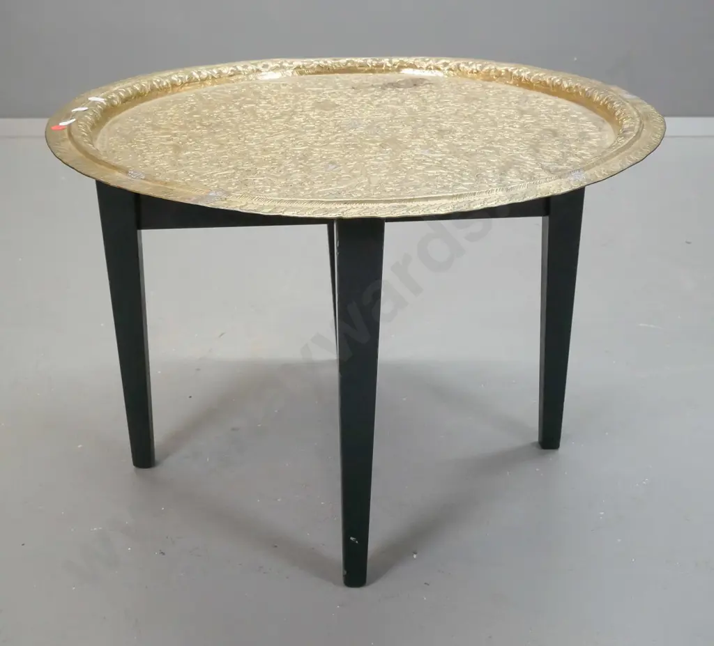 Persian style animal motif brass circular tray on ebonised timber table base - some discolouration and denting / bending Image 1++