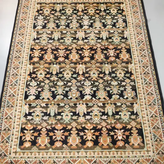 Belgian "Caucase" wool floor rug with tribal style pattern in black, green and salmon pinks L-2300 W-1600