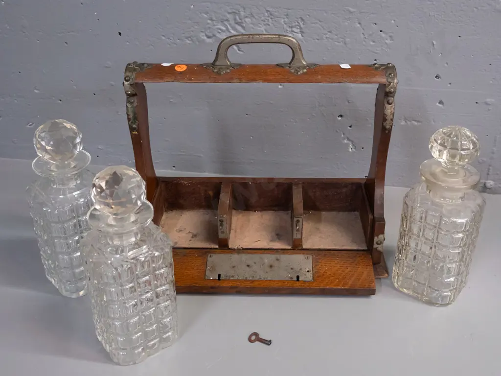 restorer's oak tantalus with 3 decanters with white metal mounts, hinged front panel with working key - 2 stoppers are Image 1++