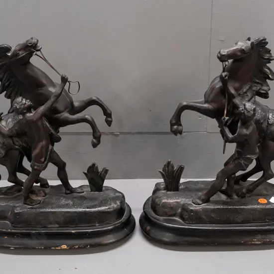 vintage pair of spelter rearing horse figures on oval ebonized wood bases - marked Coustou - reproduction based on