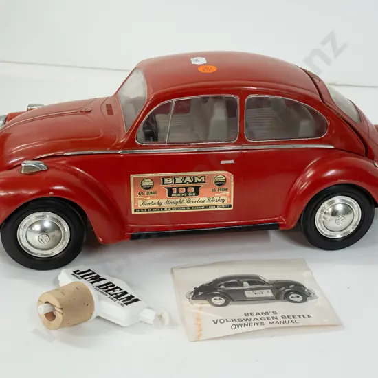 Jim Beam automotive decanter - 1973 red VW Beetle, with contents, seal intact, with a pourer and manual L-370
