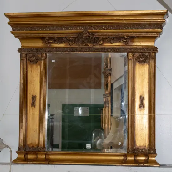 large classical style gilt framed bevelled edge wall mirror with 4 vertical columns & applied figural details H900 W980