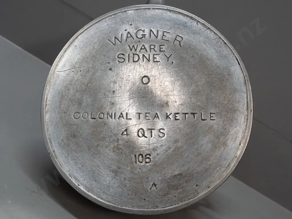 vintage streamlined design cast alloy kettle with timber and brass handle, marked Wagner Ware Sidney (Ohio) made in US, Image 1++