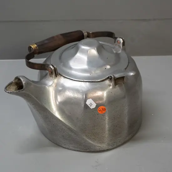 vintage streamlined design cast alloy kettle with timber and brass handle, marked Wagner Ware Sidney (Ohio) made in US,