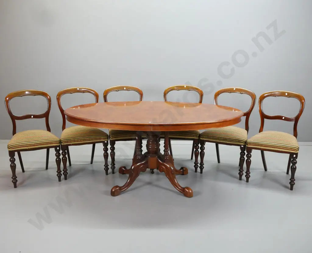 reproduction Victorian style mahogany oval dining table on 4-point cathedral base, walnut veneer top, with 6 mahogany Image 1++