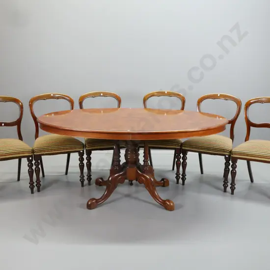 reproduction Victorian style mahogany oval dining table on 4-point cathedral base, walnut veneer top, with 6 mahogany