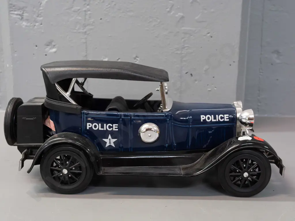 Jim Beam automobile decanter - 1929 Ford Police car - sealed, minor damage to paper seal H-180 L-370 Image 1++