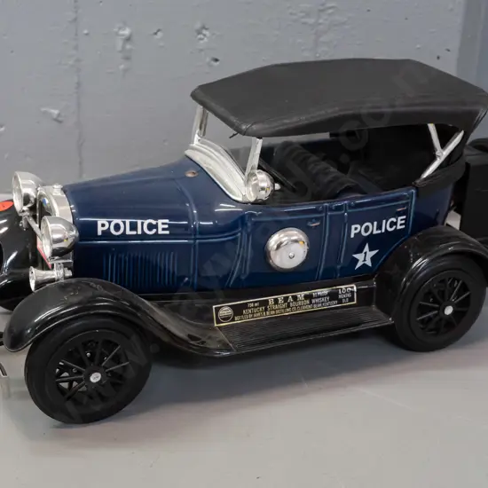 Jim Beam automobile decanter - 1929 Ford Police car - sealed, minor damage to paper seal H-180 L-370