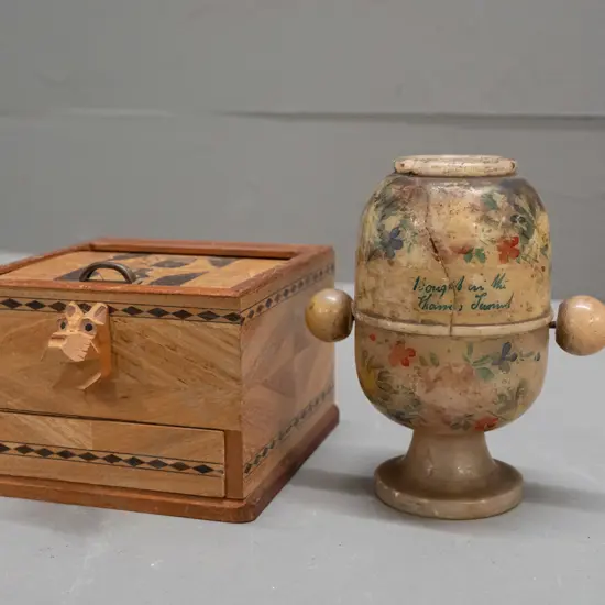 vintage souvenir alabaster "peep egg" with lens and rotating paper views of London landmarks inside -