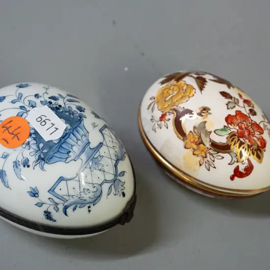 2 ceramic eggs - Limoges with brass hinged mount L-90 and the other Masons England, some tape residue