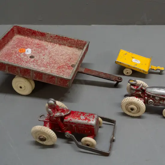 vintage Fun Ho white-wheel cast alloy vehicles - 2 tractors and 2 trailers. Larger tractor missing blade attachment,
