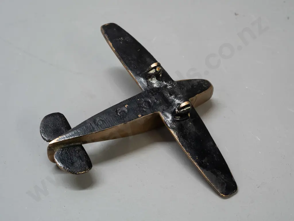 solid cast brass aeroplane model with black painted underside, missing propellor, some pitting and age wear L-160 W-190 Image 1++