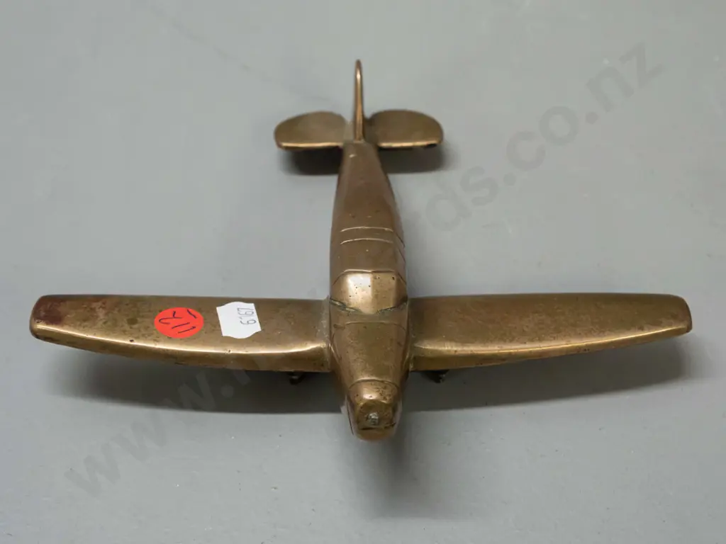 solid cast brass aeroplane model with black painted underside, missing propellor, some pitting and age wear L-160 W-190 Image 1++