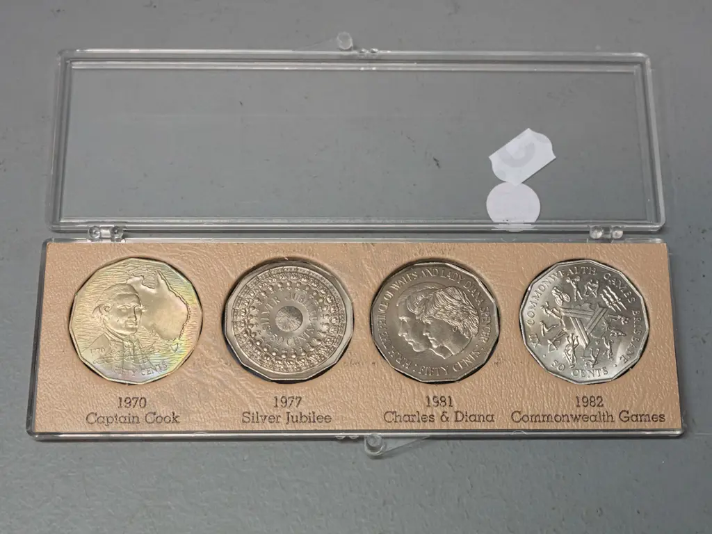 assorted coins & notes - 2 NZ penny albums, set of 4 Australian 50 cent coins, and Australian, NZ and asian bank notes Image 1++