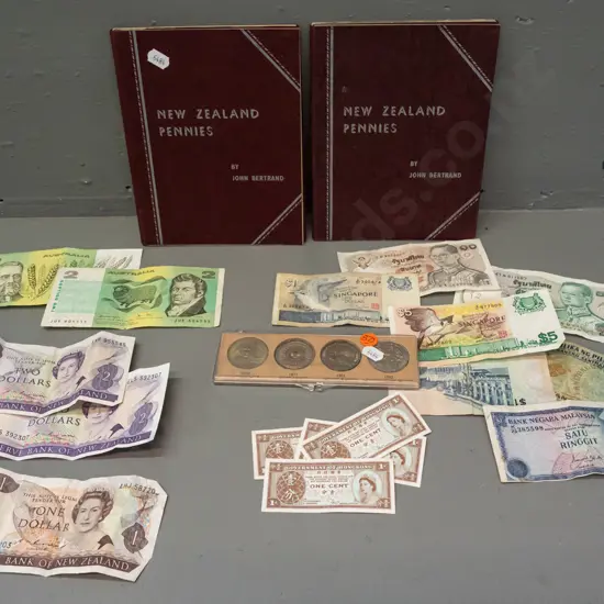 assorted coins & notes - 2 NZ penny albums, set of 4 Australian 50 cent coins, and Australian, NZ and asian bank notes