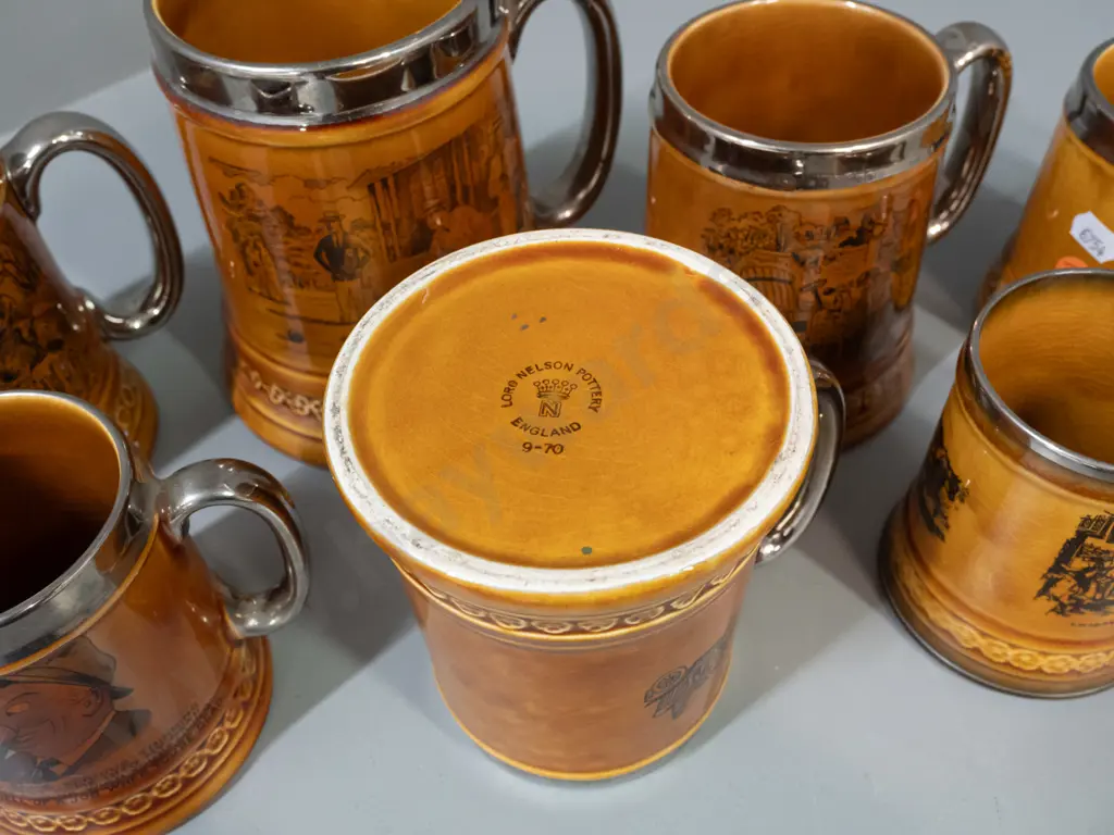 7 brown glaze tankards with silvered rims and handles, 6 are Lord Nelson pottery, smallest is Ridgways Coaching Days, Image 1++