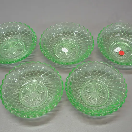5 moulded green uranium glass sweet dishes - nice glow. Diameter 135