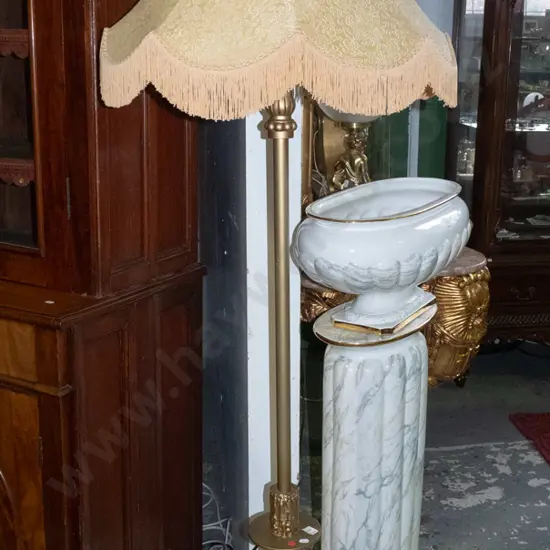 retro standard lamp with rococo style cherub in gold finish metal and moulded composite with tasseled waisted shade =