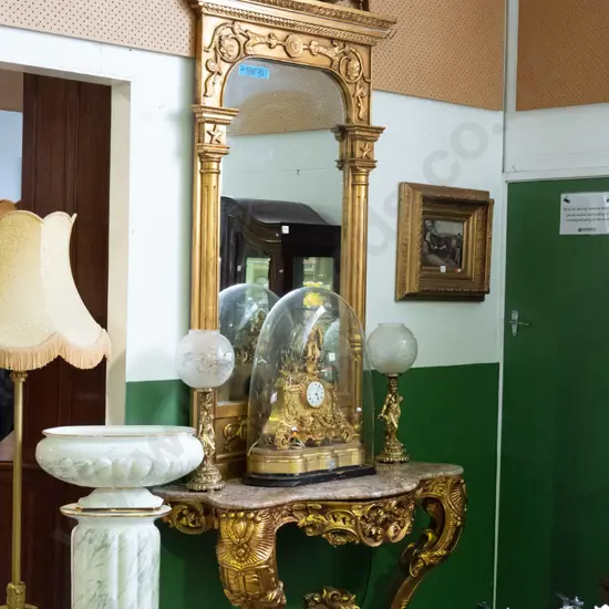 very large gilt finish combination wall mirror and marble topped hall table, with ornately carved figural legs,