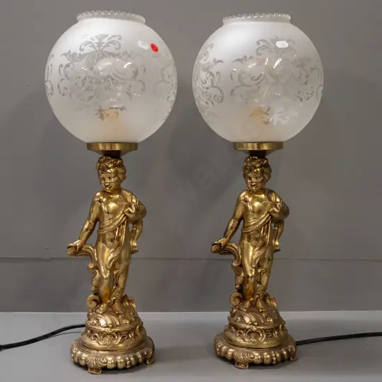 pair of rococo-style figural table lamps in gold finish with frilled-rim globe shades H-525 Shade D-190