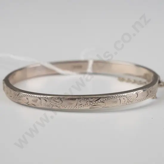 silver bangle with half engraved & safety chain broken 8gm