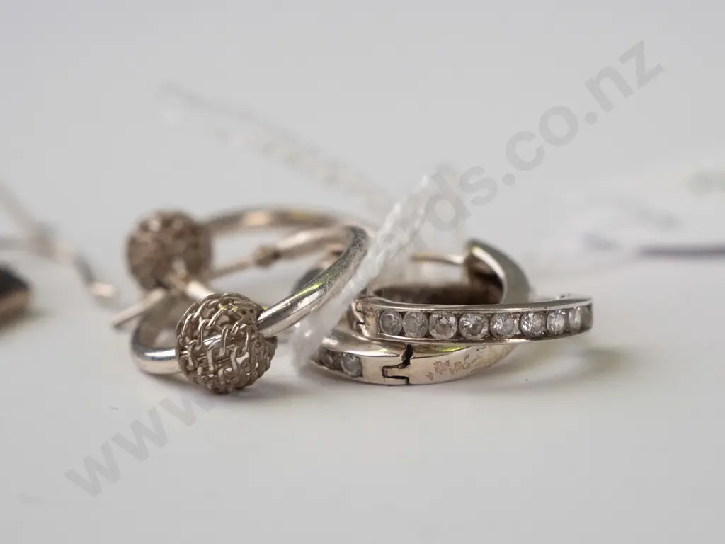 3 pairs of silver rings Image 1++