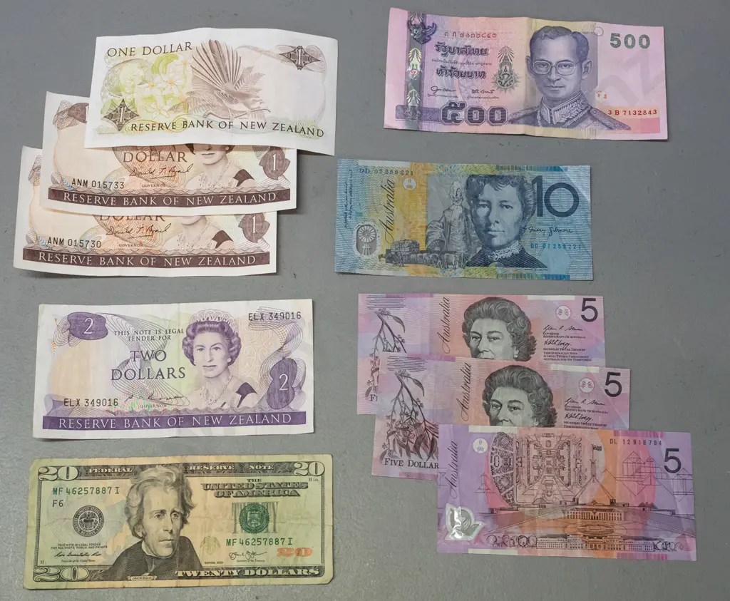 assorted bank notes in used condition - NZ $1 x 3 and $2, Australian 3 x $5 and $10, USA $20, etc. Image 1++
