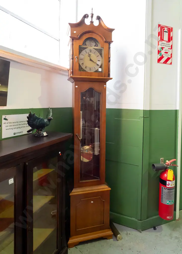 1970s long-case clock w/ brass and silver dial marked "Taget" arched top globe with Tempus Fugit inscription, arched Image 1++