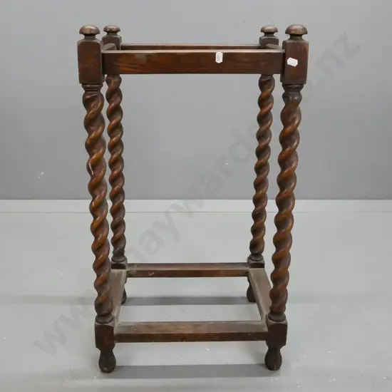 vintage oak umbrella / stick stand with Jacobean twist supports, missing bottom tray, age wear to surface H-680 W-380