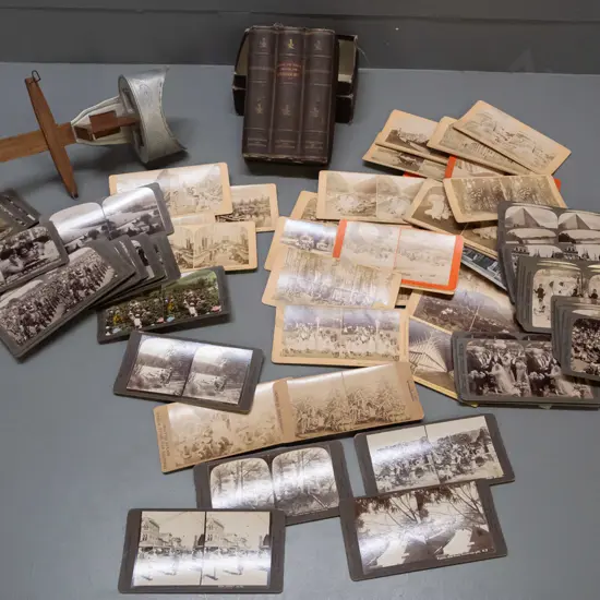 vintage stereoscope marked Underwood & Underwood New York and box of stereo view cards including New Zealand scenes