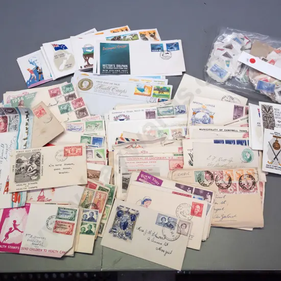 large collection of NZ first-day covers dating from 1930s, most to one Mosgiel address, plus a bag of loose used stamps