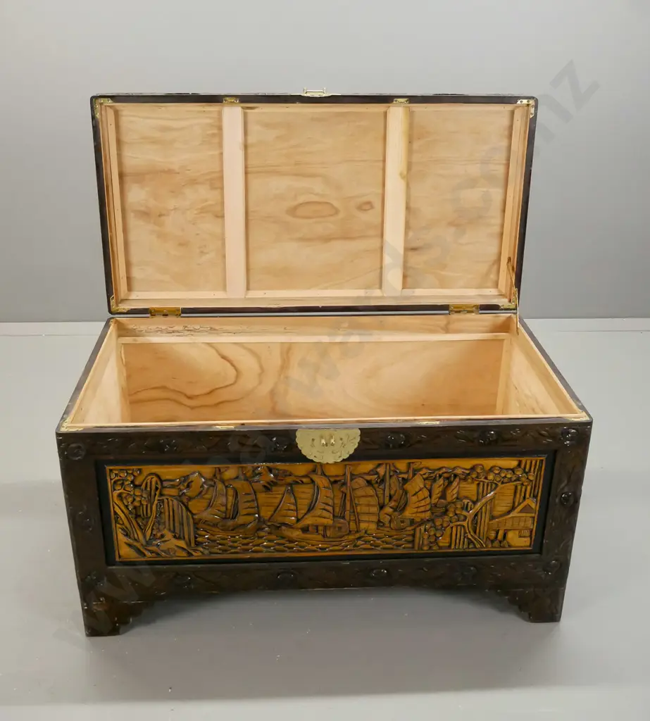 asian heavily carved camphorwood lined chest with brass lock plate and latch but no lock - some wear on corners of top Image 1++