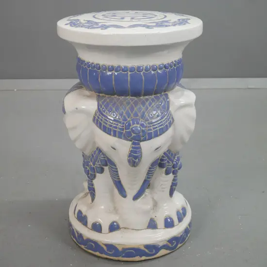 blue and white ceramic elephant motif garden seat - small lateral crack near base H-510 D-310 at top.