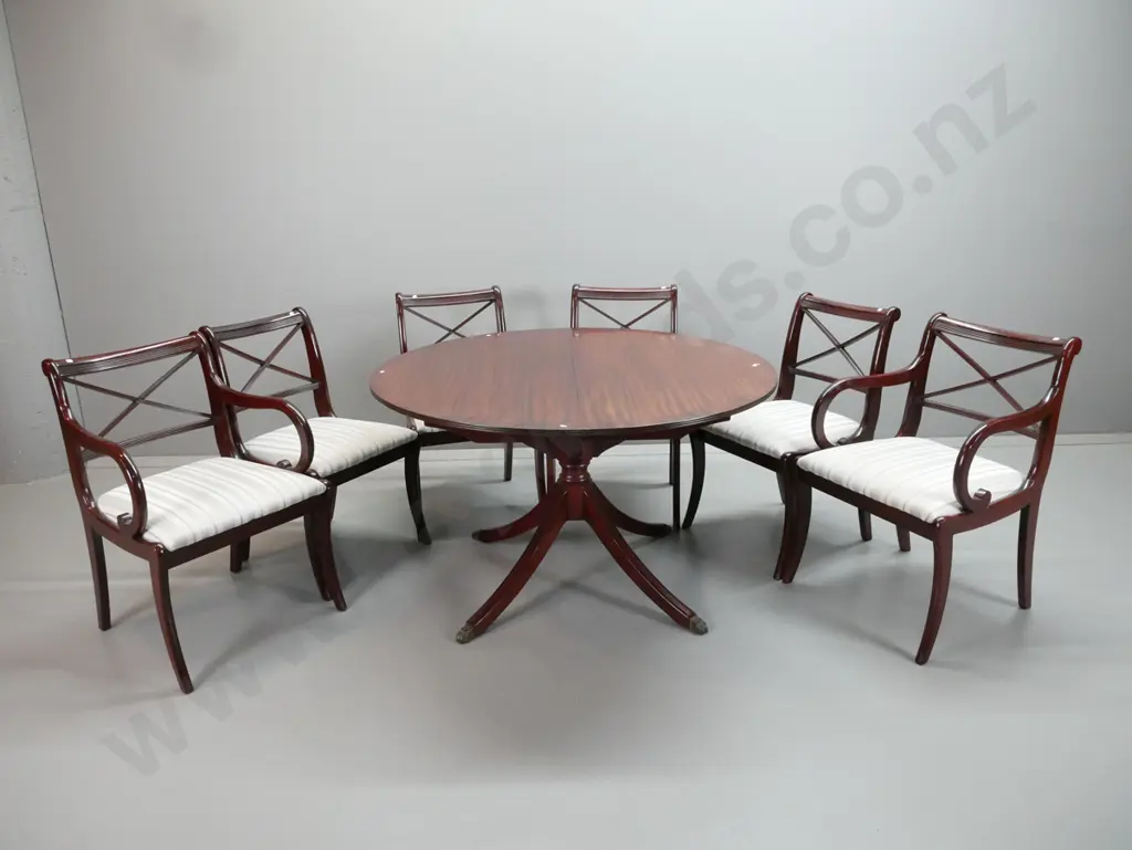 reproduction Regency style dining table and 6 chairs, extending from round to oval with hinged flip-up leaf, cross- Image 1++