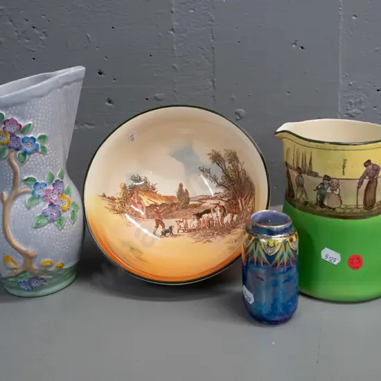 Royal Doulton Rustic England bowl, Dutch canal scene jug, Crown Devon jug with raised floral decoration and Grimwades