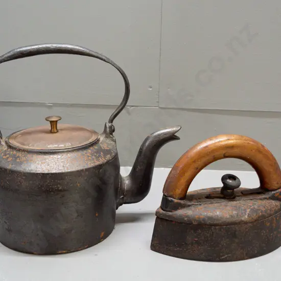 cast iron kettle H-230 L-230 and a vintage sad iron with wood handle - kettle marked T Holcroft & Son Wolverhampton
