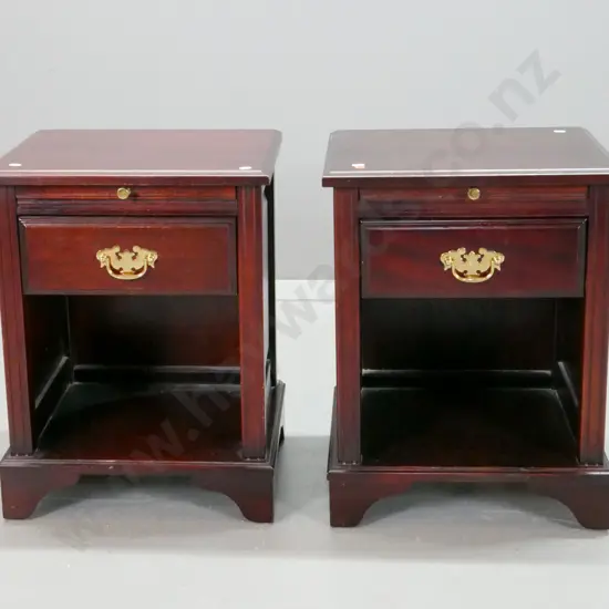 pair of reproduction mahogany bedside cabinets with single drawer, slide, panelled sides, bracket feet, brass handles -