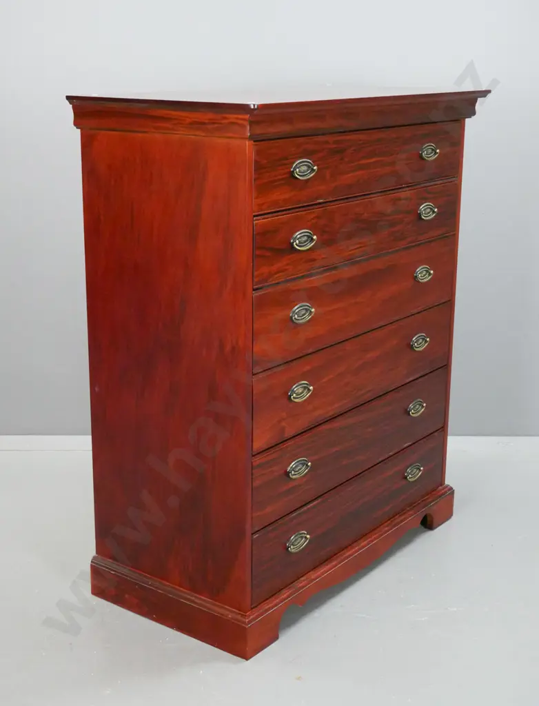 Reproduction 6 long drawer, pacific kauri chest,  with stepped top on shaped plinth, oval brass handles. Image 1++