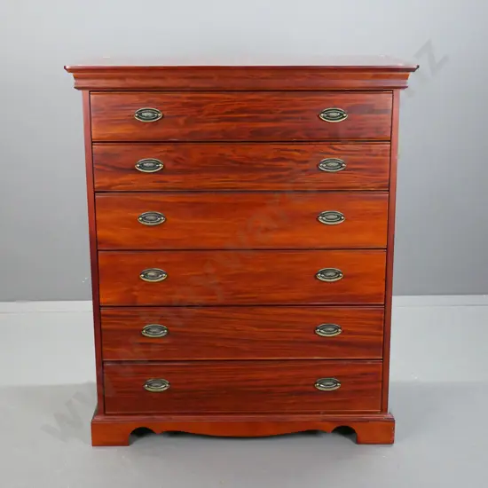 Reproduction 6 long drawer, pacific kauri chest,  with stepped top on shaped plinth, oval brass handles.