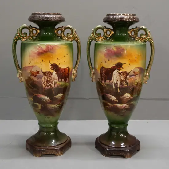pair of English Victorian vases with highland cattle scenes, gilt decoration, hand-decorated transfer, L. Reid signature