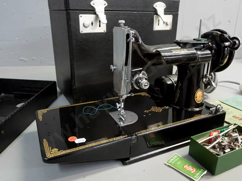 Singer 221K1 portable electric sewing machine in very good condition, in fitted hard case with pedal, manuals, box of Image 1++