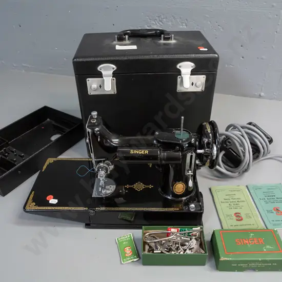 Singer 221K1 portable electric sewing machine in very good condition, in fitted hard case with pedal, manuals, box of